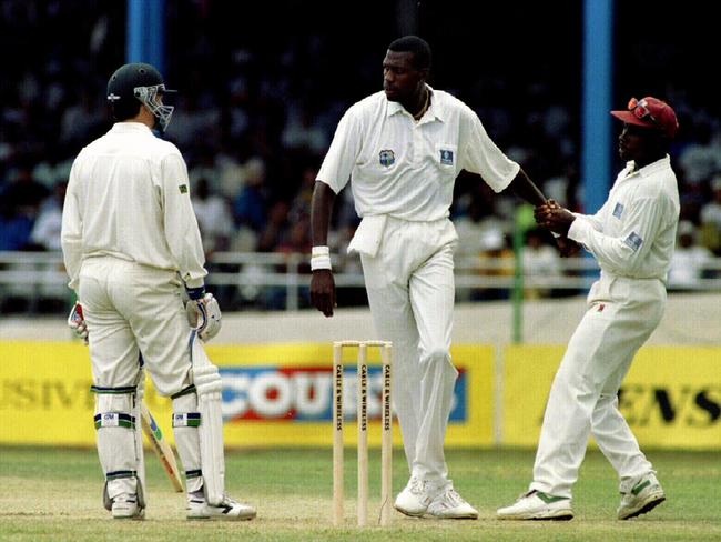 West Indies captain Richie Richardson pulls Curtly Ambrose away from Steve Waugh after things for heated in Port of Spain.