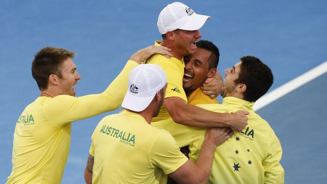 The Aussies celebrate after the win.