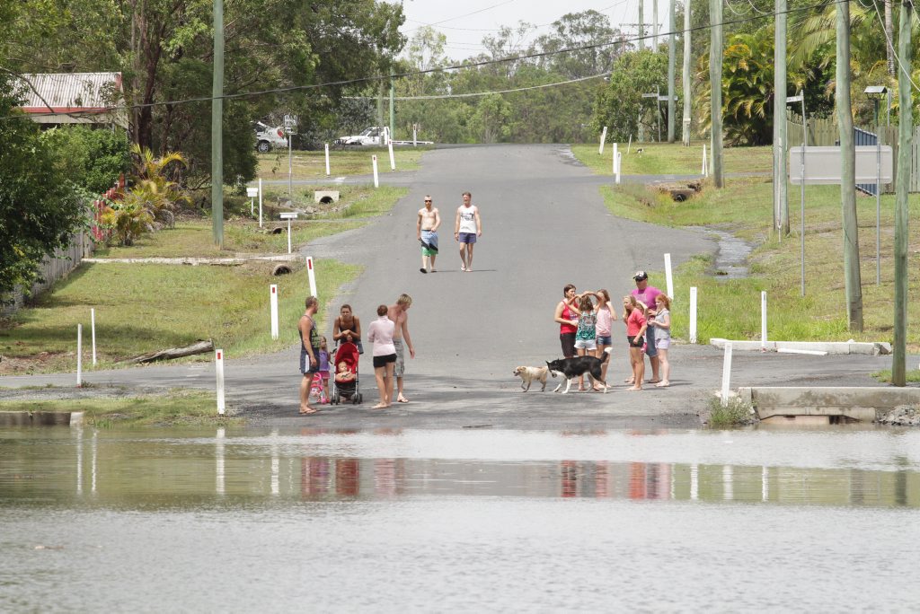 Stranded residents at Aldershot wait out the rising floodwaters on the highest ground in the town. Photo: Robyne Cuerel / Fraser Coast Chronicle. Picture: Robyne Cuerel