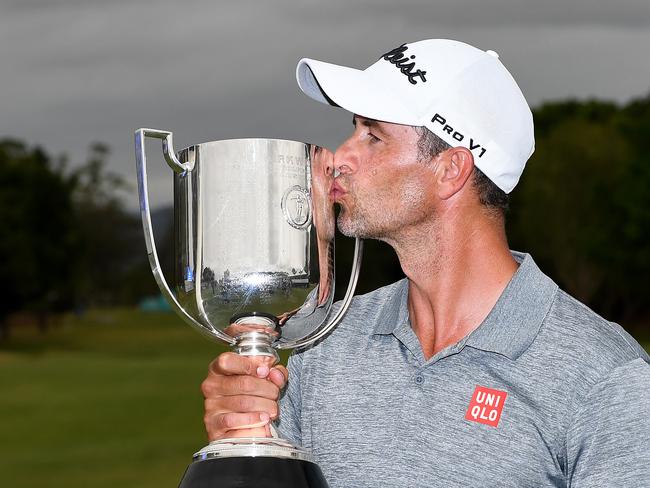 GOLD COAST, AUSTRALIA - DECEMBER 22: Adam Scott of Australia celebrates victory as he holds up the Kirkwood Cup during day four of the PGA Championships at RACV Royal Pines on December 22, 2019 in Gold Coast, Australia. (Photo by Bradley Kanaris/Getty Images)