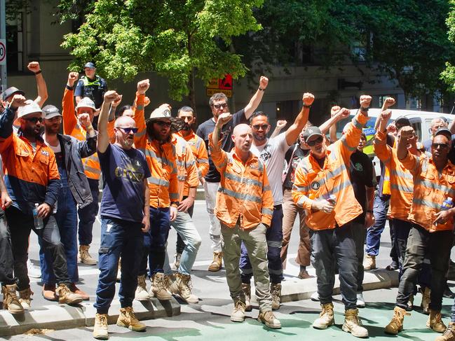 MELBOURNE AUSTRALIA - NewsWire Photos DECEMBER 13, 2024. CFMEU members strike outside Fair Work Australia offices against the sacking of CFMEU official Esther Van Arend.Picture: NewsWire / Luis Enrique Ascui