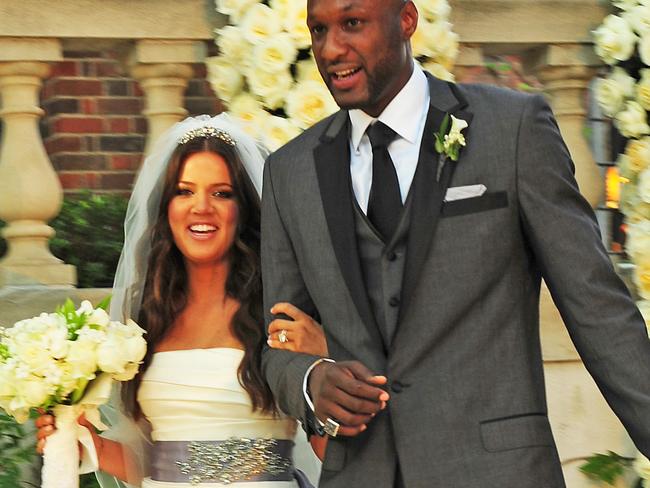 *ONE TIME WEB USE ONLY* *CALL NETWORK FOR PRINT USE* Exclusive/Just Released-Beverly Hills, CA 09/27/09- Khloe Kardashian (Keeping Up With the Kardashians) Marries LA Laker basketball star Lamar Odom in Beverly Hills. The Sunday evening wedding took place at the multi million dollar Beverly Hills home of music producer Irivin Azoff. Kardashian was given away by her step father, Olympic gold medal winner Bruce Jenner. We even caught up with the Kardashian clan the night before at the rehearsal dinner at Lobster in Santa Monica and the as they got ready the day of the wedding at the Beverly Wilshire Hotel. -PICTURED: Khloe Kardashian, Lamar Odom -PHOTO by: JAKE HOLLY/Startraksphoto.com -JKH219443