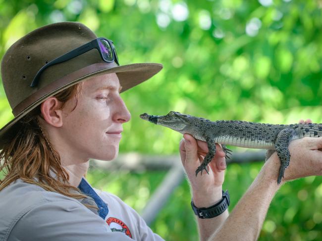 Croc wrangler/keeper/tour guide Payton Prosser at Crocodylus Park. Picture: Glenn Campbell