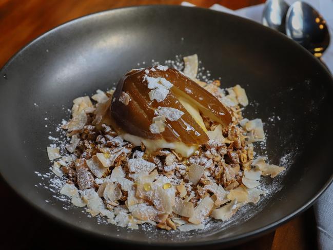 Roasted almond and sunflower granola with poached pear. Picture: Jenifer Jagielski