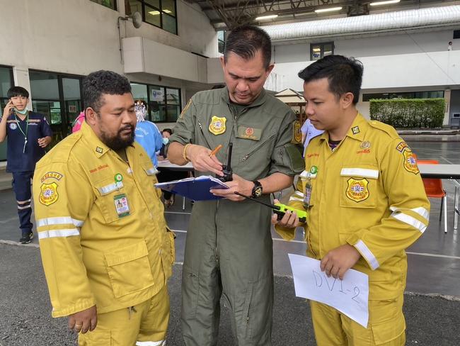 Piyalak Kinkaew, Chief of EMS Ruamkatanyu operation team, was first on scene on the tarmac after the Singapore Airlines aircraft touched down in Bangkok, where he triaged injured passengers and help treat Aussies. Picture: Jang Sawitree