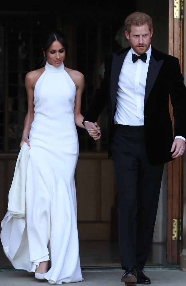 The Duchess of Sussex and Prince Harry head to their evening reception. Picture:  Steve Parsons - WPA Pool/Getty Images.