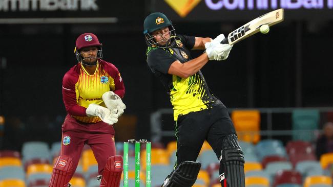 Tim David smacked four boundaries and three sixes. Photo by Patrick HAMILTON / AFP