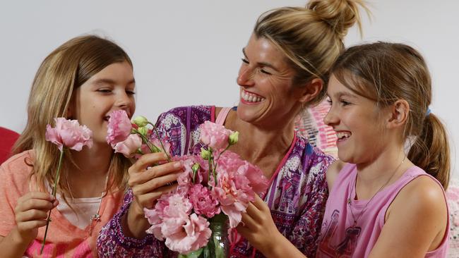 Lizzy with her children Ruby, 8, and Stella, 10, Williamson at home as she talks about post natal depression