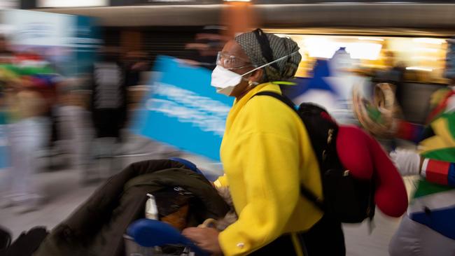 Passengers arrive at Cape Town International airport as the first batch of regional and international flights landed in South Africa on October 1, 2020, as borders reopened after a more than six-month shutdown to limit the spread of coronavirus. Picture: AFP