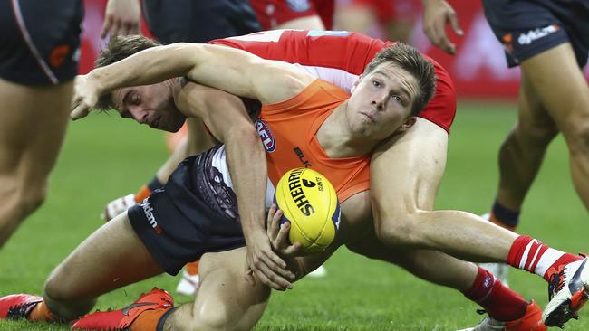 Toby Greene is tackled by Nick Smith when the Giants played the Swans at Spotless Stadium earlier this season.  Picture: Getty Images