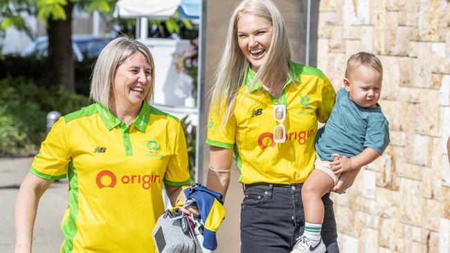 Australian Diamonds netball coach Stacey Marinkovich with Firebirds player Gretel Bueta and son Bobby. Picture: Richard Walker