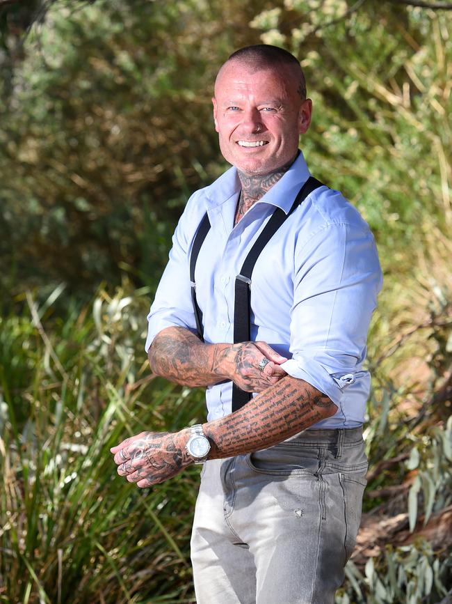 Real estate agent Adam Flynn says his career has flourished despite his ink. Picture: Josie Hayden