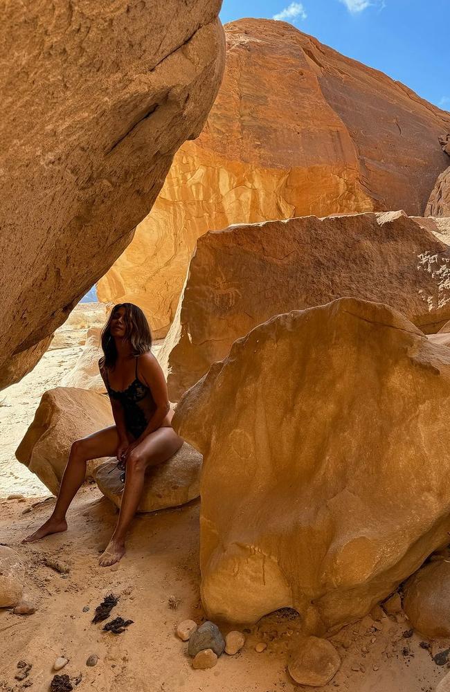 Halle Berry shared this sexy selfie sitting among giant rock formations.