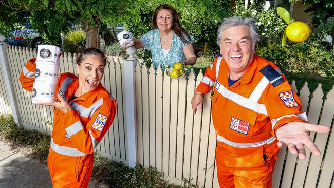 SES members Phil Wall and Evette Davis with neighbour Marie Callanan, a nurse from Frankston Private Hospital. Picture: Tim Carrafa