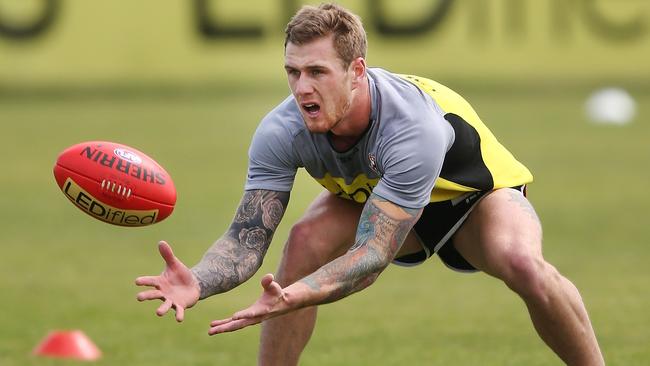 MELBOURNE, AUSTRALIA - NOVEMBER 05: Saints newest recruit Tim Membrey marks the ball during a St.Kilda Saints AFL training session at Linen House Oval on November 5, 2014 in Melbourne, Australia. (Photo by Michael Dodge/Getty Images)