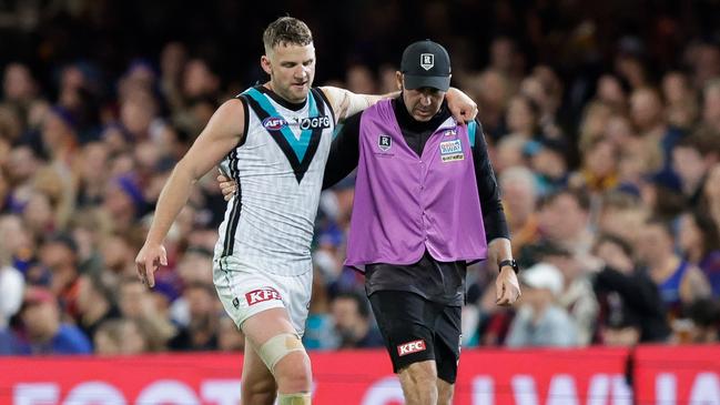 Trent McKenzie was hurt late in the third term. Picture: Russell Freeman/AFL Photos