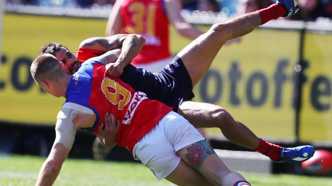 Brisbane captain Dayne Beams throws Jeff Garlett to the ground. Picture: Michael Klein