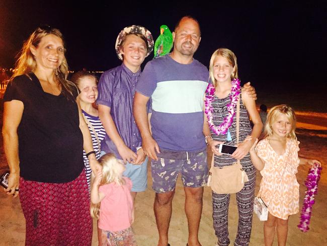 TripADeal managing director Norm Black with his family on a recent trip to Waikiki.
