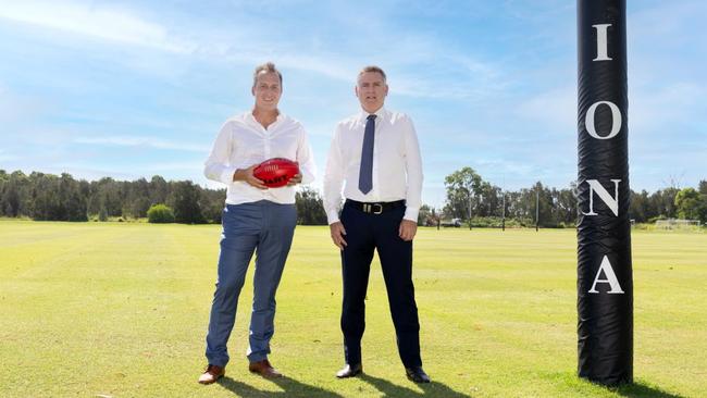 Pictured are Damien Mitchelmore (AFL Venue &amp; Government Partnerships Manager, QLD), and Iona College Principal Trevor Goodwin.