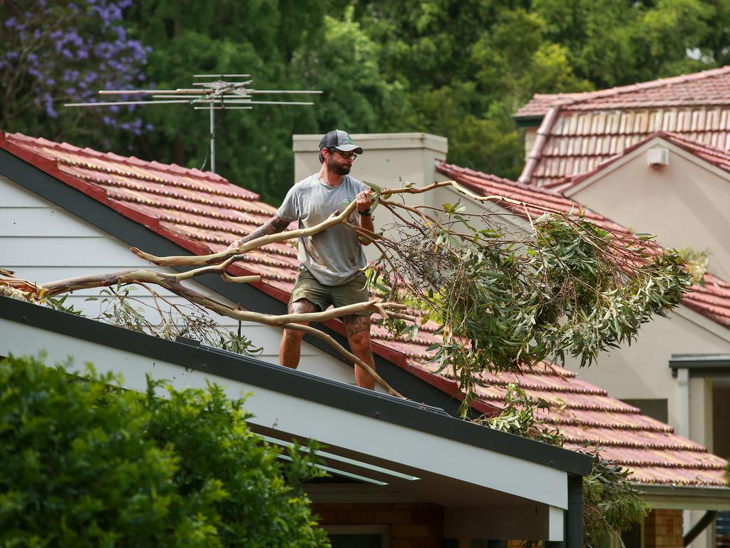 The clean up operationin Church Street, Pymble, after a storm hit some of the northern suburbs of Sydney. Picture: Justin Lloyd