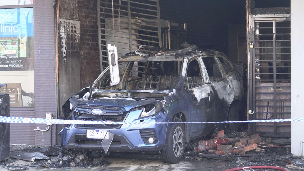 The fire and car smash up has left the store a smouldering wreck. Picture: NewsWire / Valeriu Campan