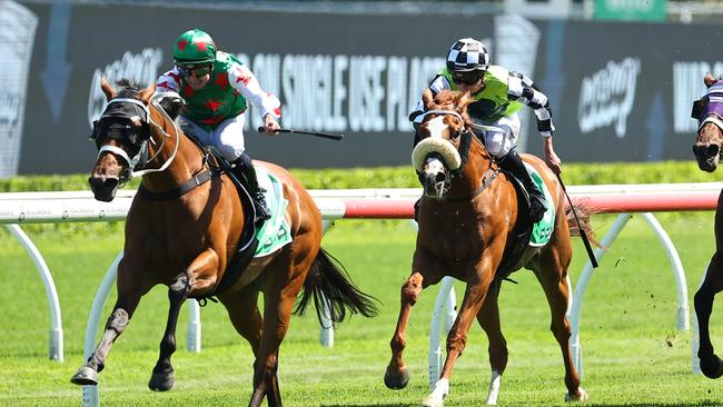 Reece Jones controlled the race in front on Autumnmation (left) at Randwick. Picture: Getty Images