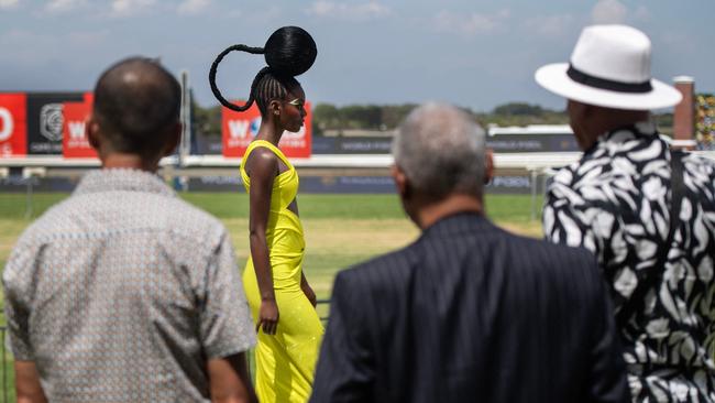 People watch a fashion show at the Met Horse Race at Kenilworth Racetrack in Cape Town. Picture: Rodger Bosch/AFP