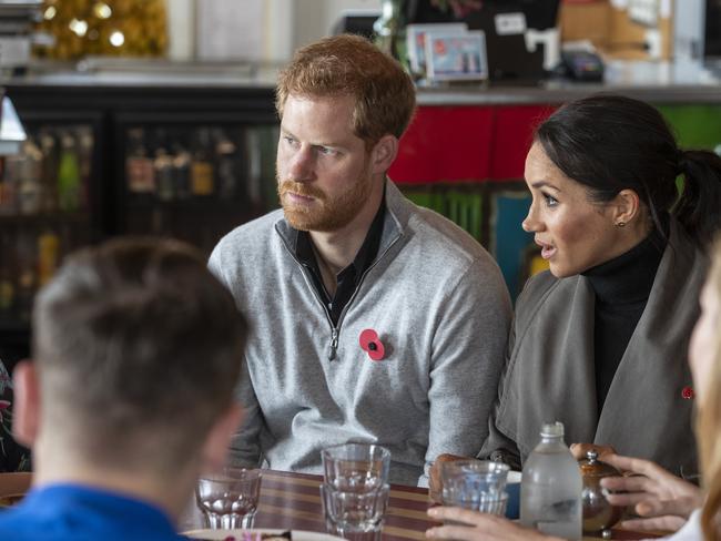 Prince Harry and Meghan, Duke and Duchess of Sussex are seen during a meeting with representatives of mental health projects at Maranui Cafe in Wellington. Picture: AAP