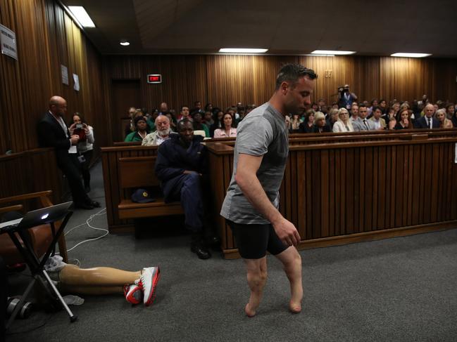 Getty Images Year in Focus 2016: Oscar Pistorius walks across the courtroom without his prosthetic legs during the third day of Oscar's hearing for a resentence at Pretoria High Court on June 15, 2016 in Pretoria, South Africa. Having had his conviction upgraded to murder in December 2015, Paralympian athlete Oscar Pistorius is attending his sentencing hearing and will be returned to jail for the murder of his girlfriend, Reeva Steenkamp, on February 14th 2013. The hearing is expected to last five days. Photo by Siphiwe Sibeko - Pool/Getty Images