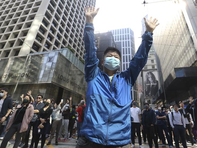 A demonstrator during a protest in the financial district in Hong Kong as protesters barricade themselves in and demand that the government hold local elections. Picture: AP Photo