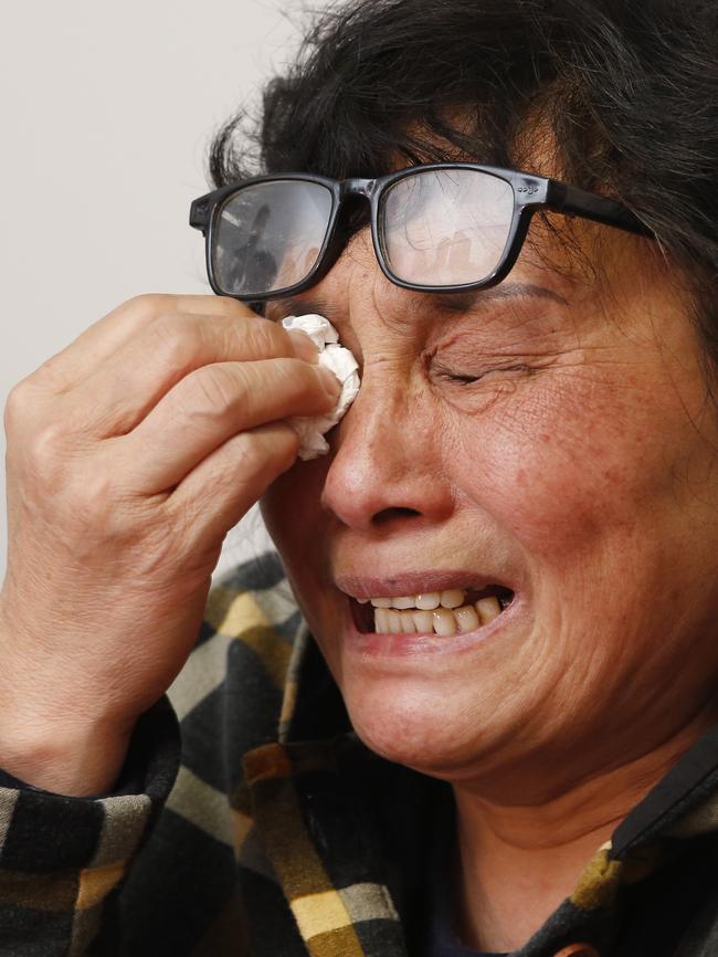 His distraught mother breaks down while talking to media yesterday. Picture: David Caird