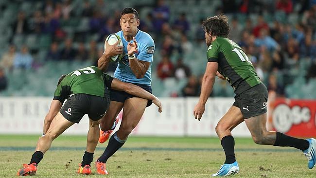 Israel Folau takes on the Bulls defence at Allianz Stadium.