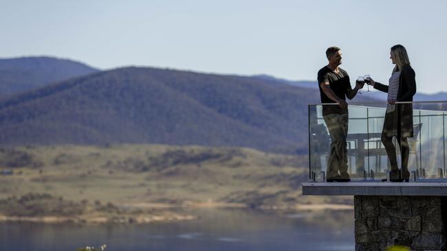 Steven Romppanen and Jaime Egan taking in the views of Lake Jindabyne. Picture: Sean Davey