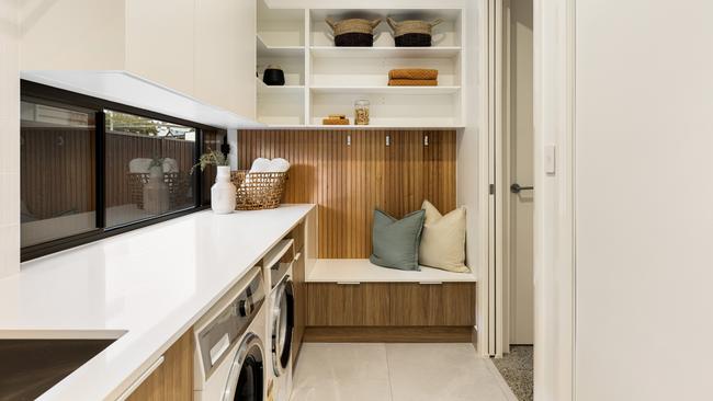 The laundry/mud room flows from the garage.