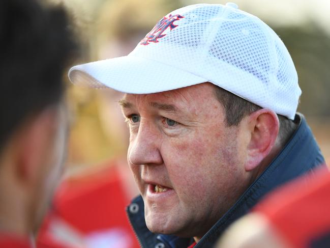 Peter Bastinac, senior coach of Montrose addresses his players during quarter time at Balwyn Park in Melbourne, Saturday, June 29, 2018. EFL (Div 1): Balwyn v Montrose. (AAP Image/James Ross) NO ARCHIVING