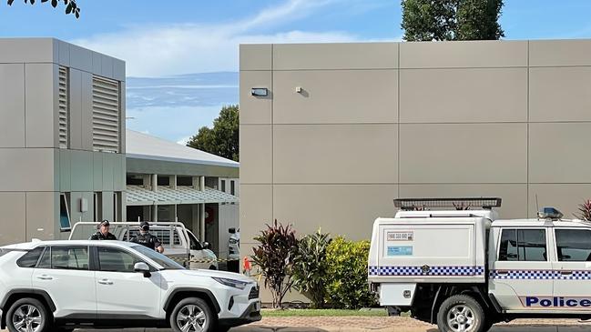 Police cars outside Peace Lutheran College in Cairns after the alleged attack.