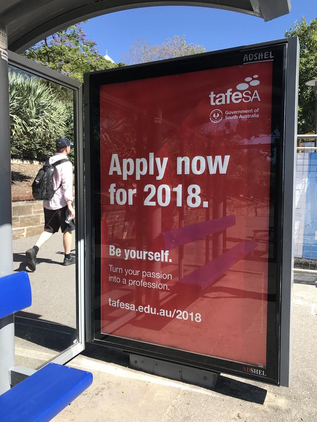 Ads for TAFE SA courses next year visible in the city, as the crisis rolls on. Picture: Cathy Davis