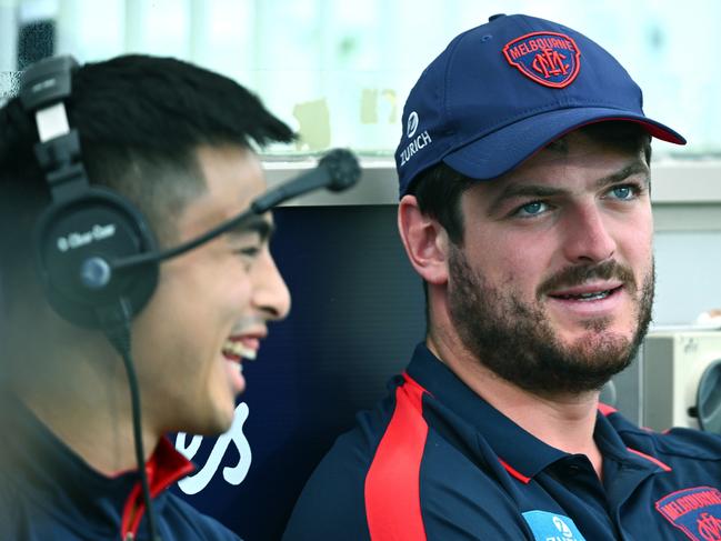 MELBOURNE, AUSTRALIA - MARCH 17:  Angus Brayshaw of the Demons sits on the bench during the round one Demons AFL match between Melbourne Demons and Western Bulldogs at Melbourne Cricket Ground, on March 17, 2024, in Melbourne, Australia. (Photo by Quinn Rooney/Getty Images)