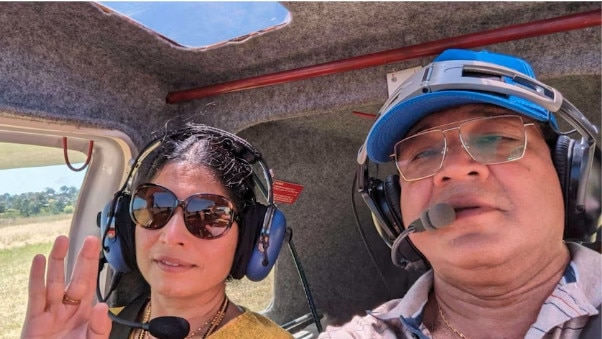 Khadervali Gagguturu (right) was pictured during another flight with his wife, Sharmila Kuttagula (left). Picture: Supplied.