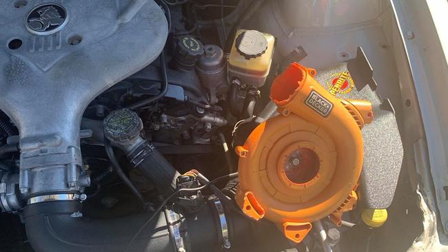 NSW Police pulled over a driver who had fitted a Black and Decker leaf blower to his engine. Photo: NSW Traffic and Highway Patrol Facebook page.