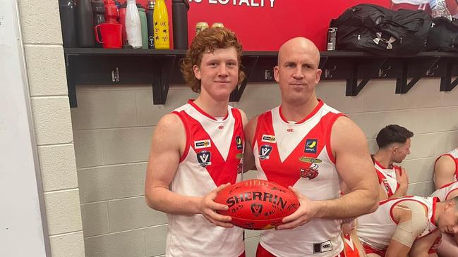 Jackson (L) with father Mick Burke post game on Saturday. Picture: FACEBOOK