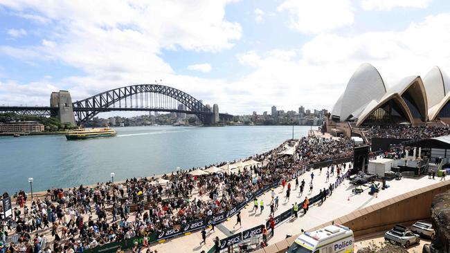 Crowds gather at the finish line at the Sydney Opera House. Picture: NewsWire / Damian Shaw