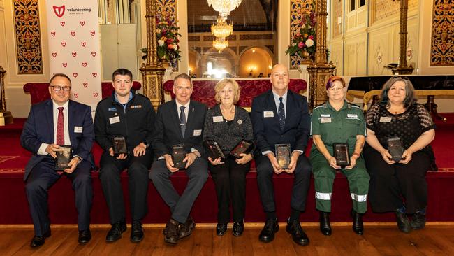 Winners of the Tasmanian Volunteering Awards 2024. Nigel Clark representing Aurora Energy (left), Risdon Vale Volunteer Fire Brigade and The Regatta Association volunteer Dillon Monks, Steve Martin representing Toast for Kids Charity, Make-A-Wish Foundation volunteer Allana Wilson, St John Ambulance Tasmania volunteer Carl Graham, St John Ambulance Tasmania volunteer Vanessa Henry, Carolyn Whamond representing Calvary Healthcare Tasmania.