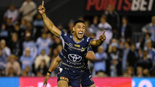 Holmes celebrates his amazing field goal against Cronulla. Picture NRL Photos