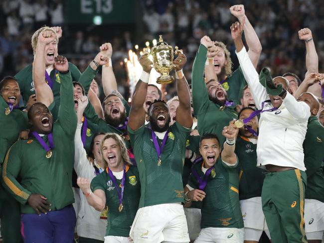 South African captain Siya Kolisi holds aloft the Webb Ellis Cup. Picture: AP