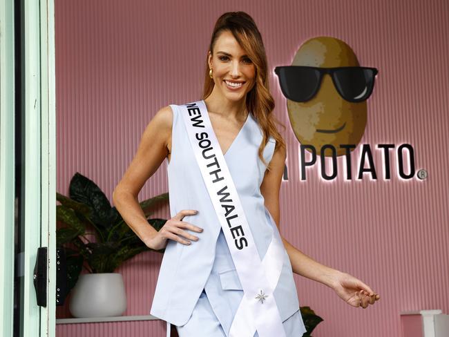 DAILY TELEGRAPH MAY 2, 2024, HOLD FOR KC. Jess Davis is the founder and CEO of the Mr Potato franchise and she's also competing in the Miss Universe title. Pictured in her sash at the Newtown store. Picture: Jonathan Ng