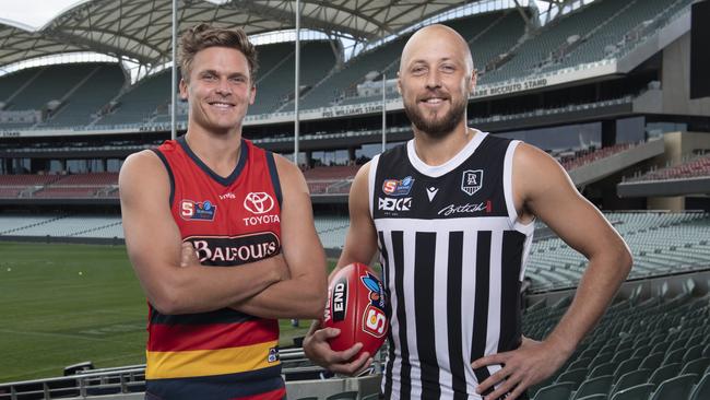 Adelaide's Hamish Latchford and Port Adelaide's Cam Sutcliffe last year. Picture: Mark Brake