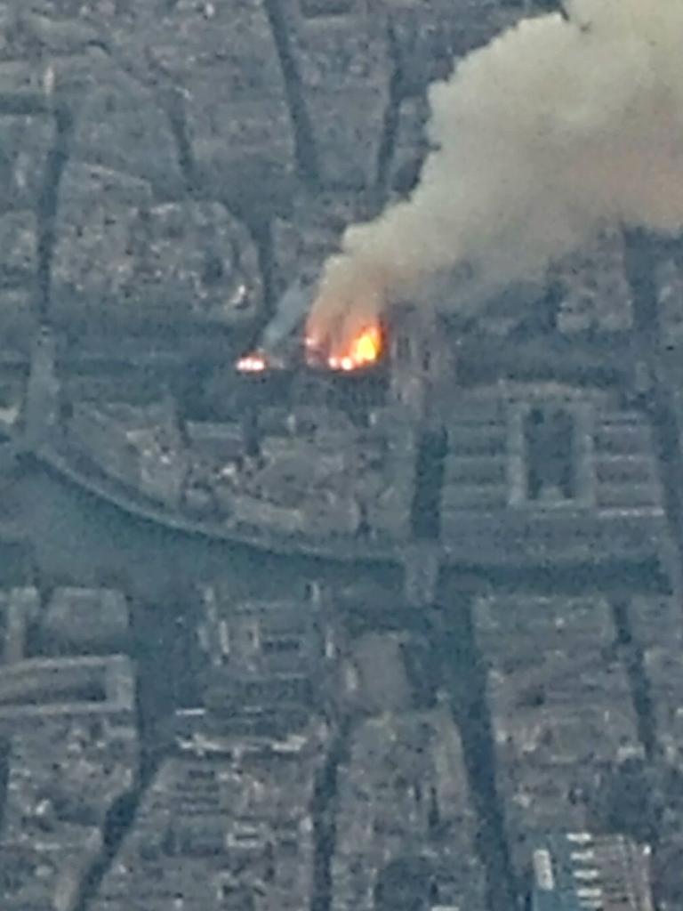 Smoke and flames rising from Notre-Dame Cathedral. Picture: AFP