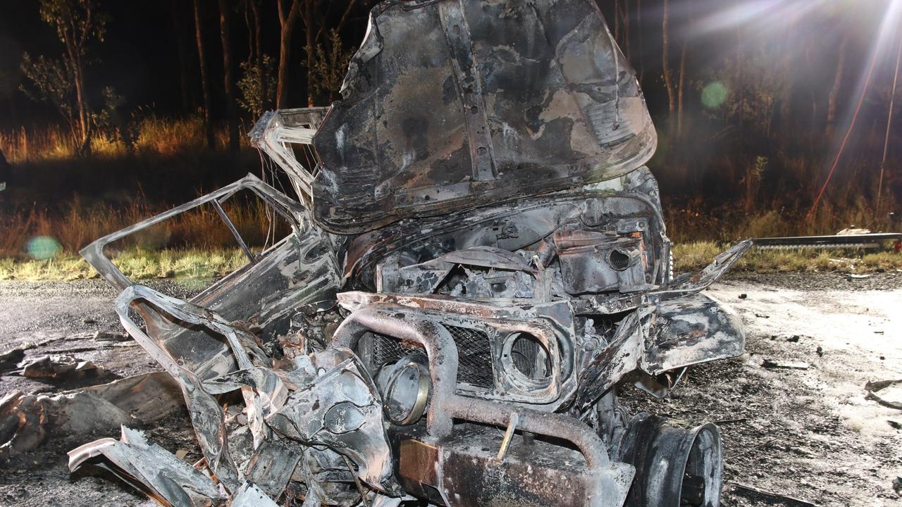 The incinerated Landcruiser vehicle involved in the fatal collision near Tieri.