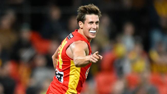 David Swallow celebrates a goal. Picture: Matt Roberts/AFL Photos/via Getty Images